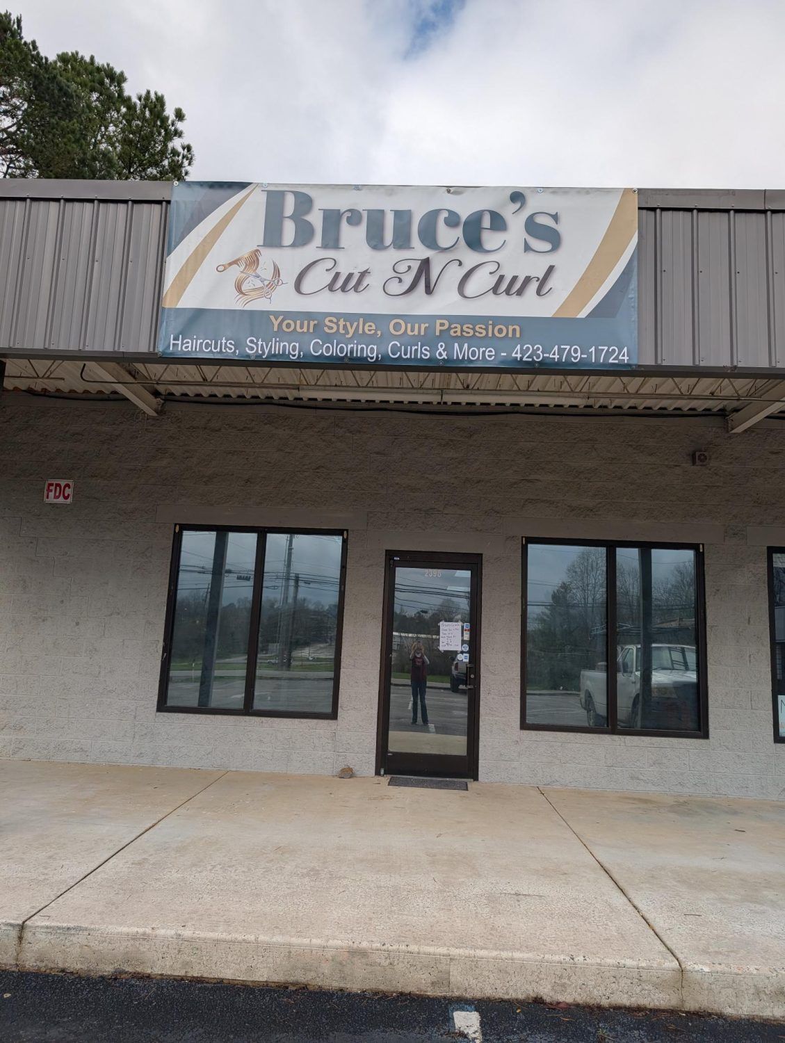 The Bruce's Cut & Curl storefront on Blue Springs Road in Cleveland, TN